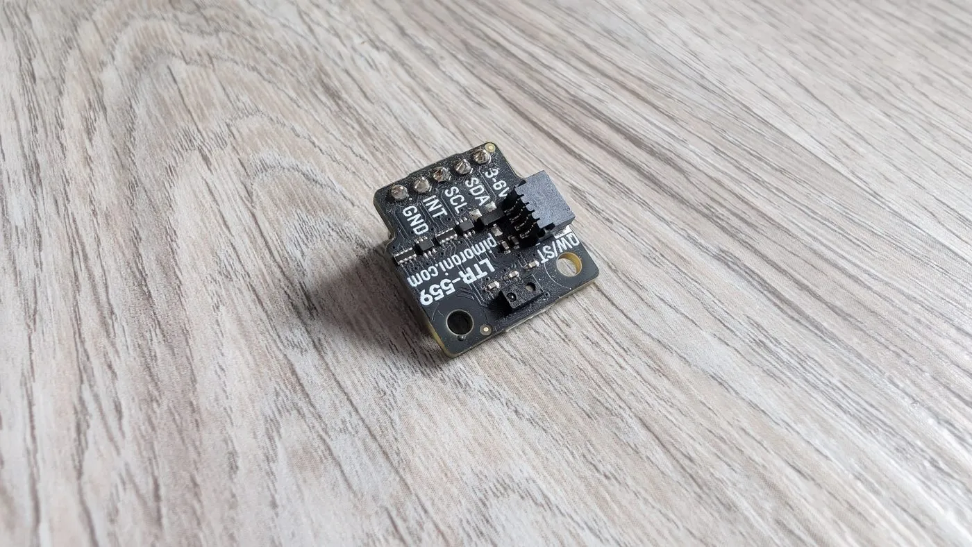 The Pimoroni LTR-559 light and proximity sensor breakout, roughly a fingertip across